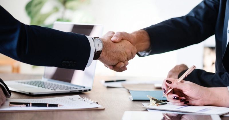 image of business handshake